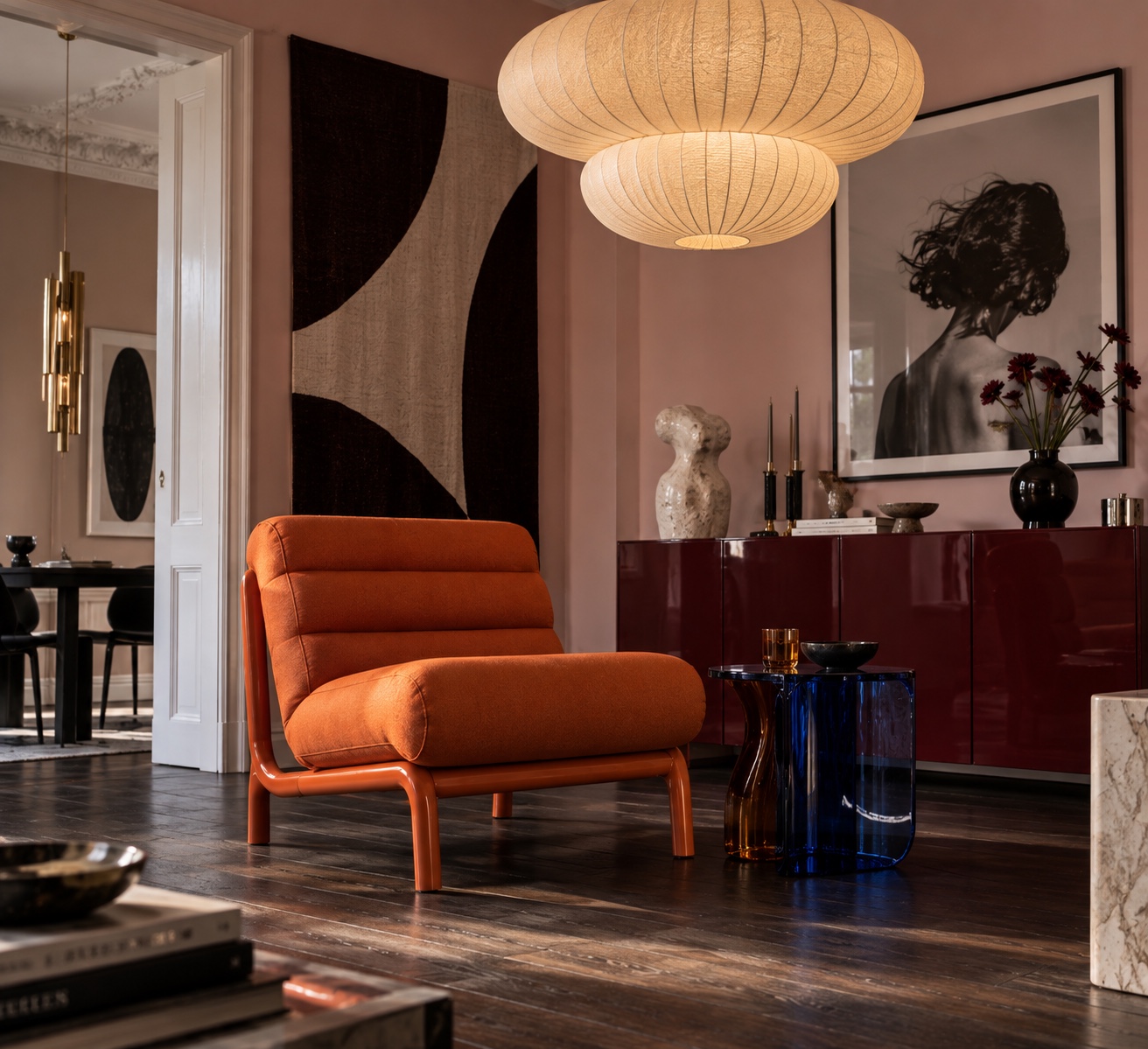An orange chair used as an unexpected accent in an individual room
